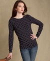 Preppy polka dots adorn Tommy Hilfiger's lightweight sweater. Pair it with your favorite jeans for a casual-chic look.