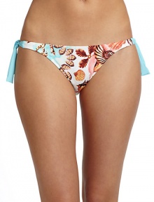 THE LOOKAllover seashell printSide tiesElastic waist and leg openingsTHE MATERIAL80% nylon/20% spandexFully linedCARE & ORIGINHand washMade in USAPlease note: Bikini top sold separately. THE LOOKAllover seashell printSide tiesElastic waist and leg openingsTHE MATERIAL80% nylon/20% spandexFully linedCARE & ORIGINHand washMade in USAPlease note: Bikini top sold separately.