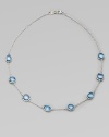 From the Scultura Collection. The pretty pastel shade of blue topaz shines through in silver-framed cabochon shapes spaced along a delicate chain.Blue topazSterling silverLength, about 18Lobster claspImported
