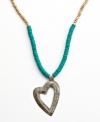 Show the love. Strung with wooden beads and a hand-cut and hammered pendant, this Heart of Haiti necklace is crafted by a co-op that supports women's employment in local communities.