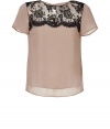 With its romantic lace overlay and pristine nude silk, Collette Dinnigans modern cut top is a chic choice for dressing up day and evening looks alike - Round neckline, sheer short sleeves, sheer black lace front yolk, key-hole cutout with button closure at nape, slit sides, longer sheer back - Loosely fitted - Wear with a high-waisted pencil skirt and heels