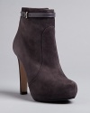 These Max Mara platform booties finish off luxurious suede, seamed uppers with elegant, slim belted ankle straps. The result is a basic with fashion authority.