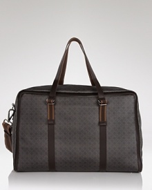 Pack your essentials and travel in style with this reservedly cool, finely crafted bag featuring an allover Gancini pattern from the classic designer Salvatore Ferragamo. Pack your essentials and travel in style with this reservedly cool, finely crafted bag featuring an allover Gancini pattern from the classic designer Salvatore Ferragamo.