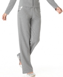 When traveling in style and comfort, choose these lounge pants by On Que. Sequined trim and a relaxed fit offer a leisurely look you'll love! (Clearance)