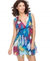 Bring the feel and look of the Mediterranean wherever you go. With bursts of vibrant color, this chic cover-up from Steve Madden doubles up as an elegant chiffon summer dress.
