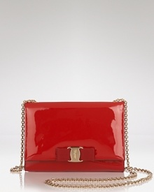 Compact style gets glossy with this patent leather shoulder bag from Salvatore Ferragamo. In step with their iconic aesthetic, it's destined to be an after-hours favorite for seasons. Compact style gets glossy with this patent leather shoulder bag from Salvatore Ferragamo. In step with their iconic aesthetic, it's destined to be an after-hours favorite for seasons.