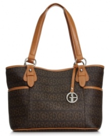 Whether you're strolling through a farmer's market or rushing off to work, this essential carryall by Giani Bernin is an excellent choice. Signature GBs and silver-tone hardware add interesting contrast, while plenty of pockets organize the interior. Whether you're strolling through a farmer's market or rushing off to work, this essential carryall by Giani Bernin is an excellent choice. Signature GBs and silver-tone hardware add interesting contrast, while plenty of pockets organize the interior.