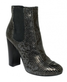 Do your look a favor and make this striking pair of boots your go-to pair this season. Juicy Couture's Roxanna booties feature an all-over snake print and elastic stretch gore on both sides.