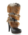 Foxy: these fashion-forward UGG® Australia boots combine high style looks with statement-making, luxe tipped Toscana fur shafts, with wearable platforms.