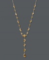 Enrich your look with warm, sunshine-inspired color. Oval, round, and pear-cut citrine (6 ct. t.w.) glow in a 14k gold setting. Approximate length: 17 inches. Approximate drop: 1-1/2 inches.