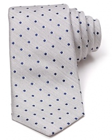 An 80s-inspired pattern from Michael Kors is wrought in lavish silk for a luxuriously soft hand, perfect for cocktail parties or wear it to work for a spirited look. An 80s-inspired pattern from Michael Kors is wrought in lavish silk for a luxuriously soft hand, perfect for cocktail parties or wear it to work for a spirited look.