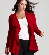Rendered in vivid merino wool, this Eileen Fisher open cardigan drapes effortlessly over pants and skirts alike, lending itself to both casual and professional looks.