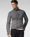 Crafted in a modern paneled construction from super-soft cotton terry and silky, moisture-wicking microfiber, the essential full-zip mockneck is designed for enhanced movement and athletic performance.