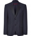 Luxurious tuxedo jacket from NYC favorite designer, Marc Jacobs, is a mix of sophisticated and modern style - Made of a highest quality dark-blue merino-wool blend - Features a fashionable slim cut, narrow waist, moderately deep lapels, a two-button front and flap pockets - Perfect choice for parties or fine events like a gala or a wedding - Pair with matching pants for a polished look, or with jeans for a chic look at a creative event