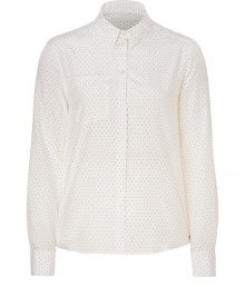 Stylish top in fine, cream silk and cotton blend - Elegant, on-trend polka dot motif - Slim, classic button down silhouette, cut slightly longer in the back - Small collar, chest pocket and gently rounded hem - Chic and timeless, great for everyday - Go for a casual look with jeans and ballet flats, or dress it up with a pleated mini and ankle booties