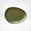 Borrowing from nature, this Pebblestone dessert plate is metaphorically contoured and highly glossed in straightforward colors. The silhouette, a DVF signature, makes tables shine. Create interesting contrasts or pair with perfect matches.