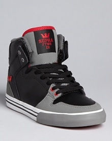 Supra goes back to the future with this updated basketball shoe, decked out with contrast overlapping panels, an extra high collar and perfect perforation details. Supra goes back to the future with this updated basketball shoe, decked out with contrast overlapping panels, an extra high collar and perfect perforation details.