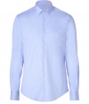 Classic button-down shirt in crisp light blue cotton - Hint of stretch creates a flattering fit - Small collar, full placket, slim long sleeves - Rounded hem - Looks great with light or navy suits at the office, or with favorite dark jeans for a polished casual look