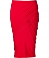 Luxe pencil skirt in fine, crimson viscose stretch - A modern classic from Donna Karan - Elegant, asymmetric drape and ruching at hips create a knockout silhouette, elongating the entire body - Curve-hugging cut hits at knee - Sexy and sophisticated, a dynamite must for parties and events - Style with a silk or sequin top and ankle booties or platform pumps