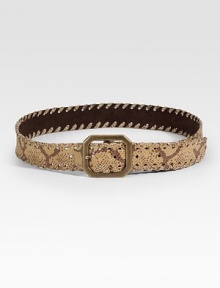 Snake embossed leather with antique brass hardware reverses to smooth suede for two looks in one.Whipstitching Clipped corner buckle About 1½ wide Suede lining Made in USA OUR FIT MODEL RECOMMENDS ordering true size. Snake embossed leather with antique brass hardware reverses to smooth suede for two looks in one.Whipstitching Clipped corner buckle About 1½ wide Suede lining Made in USA OUR FIT MODEL RECOMMENDS ordering true size.