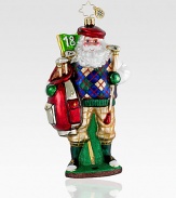 Wearing a preppy argyle sweater, a handcrafted glass Santa hits the open field while carrying his trusty gold clubs. Hand-blownHand-painted6 tallMade in Poland