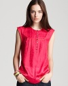 Turn up the charm with this MARC BY MARC JACOBS silk top. Regal jacquard fabric in a berry hue adorned with citrus accents and pearlized buttons create unique feminine style.