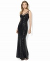 Lauren Ralph Lauren's glamorous floor-length gown is rendered in glistening sequins and finished with mesh panels at the shoulders for a sexy, feminine look.