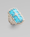 A lavishly detailed ring in sterling silver and 18K gold with a Florentine finish, delicate granulated edging, turquoise cabochons and diamond accents.Diamonds, 0.03 tcw Turquoise Sterling silver and 18K gold About 1 X ½ Imported