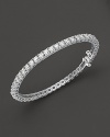 Diamond tennis bracelet in a four-prong white gold setting.