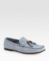 Soft suede moccasin with bamboo tassel detail.Leather soleMade in Italy