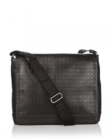 Messenger bag with gancini embossed all over. Plain bottom strip on bottom with Ferragamo signature embedded. Adjustable strap. Zip pocket inside. Messenger bag with gancini embossed all over. Plain bottom strip on bottom with Ferragamo signature embedded. Adjustable strap. Zip pocket inside.