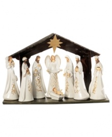 Each piece beautifully crafted of pure white porcelain, this glowing nativity scene depicts the birth of Baby Jesus with Mary, Joseph and the divine angel watching over them. Embellished with gold details. Each piece beautifully crafted of pure white porcelain, this glowing nativity scene depicts the birth of Baby Jesus with Mary, Joseph and the divine angel watching over them. Embellished with gold details.