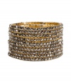 Inject instant glamour into any outfit with R.J.Grazianos set of stretchy bangles, a chic and easy choice for dressing up your look - Prong set stones, slips on - Wear with edgy separates, or as a finishing touch to cocktail dresses
