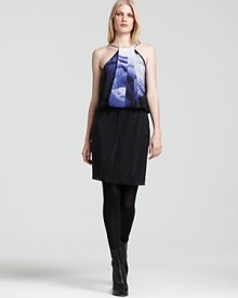 A poised tulip-print blossoms on this Robert Rodriguez dress, boasting a feminine cinched waist and draped pleats.