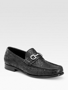 Elegant crocodile with striking gancini ornament for that signature touch.Silvertone bit detail Leather lining Padded insole Leather sole Made in Italy Elegant crocodile with striking gancini ornament for that signature touch.Silvertone bit detail Leather lining Padded insole Leather sole Made in Italy