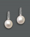 Nothing says black tie elegance like polished pearl drops. Effy Collection earrings feature a single, cultured freshwater pearl (9-1/2 mm) accented by sparkling round-cut diamonds (1/5 ct. t.w.). Earrings crafted in 14k white gold. Approximate drop: 3/4 inch.