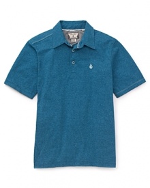 The classic polo is updated in a cotton slub with cool asymmetrical piecing along the shoulder and sides. The classic polo is updated in a cotton slub with cool asymmetrical piecing along the shoulder and sides.
