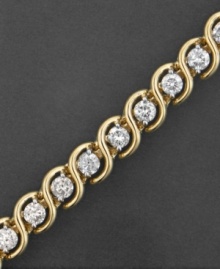 Pure beauty. This diamond bracelet features round-cut diamonds (5 ct. t.w.) set in 14k gold. Approximate length: 7-1/4 inches. Pure beauty. This diamond bracelet features round-cut diamonds (5 ct. t.w.) set in 14k gold. Approximate length: 7-1/4 inches.