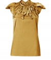 Raise the bar on contemporary classics with Steffen Schrauts elegant gold silk stretch top -  Butterfly cap sleeves and decorative fringe trim at neckline - Small stand up collar ties at back with an oversize bow - Fitted, feminine silhouette tapers gently through waist - Pair a blazer or denim jacket and style with with pencil skirts, skinny denim or dress trousers