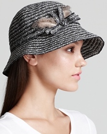 This oh-so-refined cloche from August Accessories plucks its style right from the runways, with natty feathered accents. This oh-so-refined cloche from August Accessories plucks its style right from the runways, with natty feathered accents.