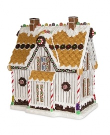 What a treat. Byers' Choice tells a sweet Christmas story with the Vanilla Icing Gingerbread House. Cookie shingles, peppermint columns and sugary gumdrop trim make the festive collectible look almost good enough to eat.