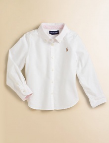 An all-season favorite and wardrobe essential in soft cotton oxford. Button-down collar Long sleeves with button barrel cuffs Button placket Embroidered polo pony logo Back yoke and box pleat Shirttail hem Cotton Machine wash Imported Please note: Number of buttons may vary depending on size ordered. An all-season favorite and wardrobe essential in soft cotton oxford. Button-down collar Long sleeves with button barrel cuffs Button placket Embroidered polo pony logo Back yoke and box pleat Shirttail hem Cotton Machine wash Imported Please note: Number of buttons may vary depending on size ordered.