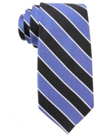Bold stripes recall classic heritage styling. This Tommy Hilfiger tie exudes classic cool. Bold stripes recall classic heritage styling. This Tommy Hilfiger tie exudes classic cool.