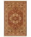 Intricately designed in the classic Serapi-style of Persia with a striking center medallion, this rug is painstakingly crafted to capture the abrash or stria effect often associate with aged vegetable dyes. After weaving, each rug is given a special antique wash to further harmonize the colors with a rich vintage patina.