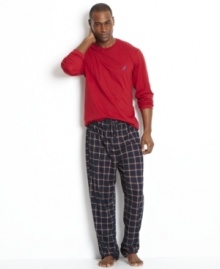 Pajama set by Nautica includes a long sleeve solid pullover and a plaid drawstring pant. Makes a great gift. Pajama set by Nautica includes a long sleeve solid pullover and a plaid drawstring pant. Makes a great gift.