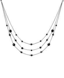 Add simple layers for a dynamic look. This stunning Monet illusion necklace features three graduated tiers of sparkling jet beads strung from a silver tone mixed metal setting. Approximate length: 18 inches + 2-inch extender. Add simple layers for a dynamic look. This stunning Monet illusion necklace features three graduated tiers of sparkling jet beads strung from a silver tone mixed metal setting. Approximate length: 18 inches + 2-inch extender.