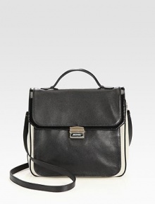 EXCLUSIVELY AT SAKS.COM Sumptuous pebble grain leather pairs with sturdy canvas in this structured flap-front carryall, finished with sleek patent leather trim.Top handle, 2 dropAdjustable shoulder strap, 24-25½ drop Flap and clasp closureOne outside open pocket under flapOne inside zip pocketOne inside open pocketFully lined11¾W X 10½H X 5¾DMade in Italy EXCLUSIVELY AT SAKS.COM Sumptuous pebble grain leather pairs with sturdy canvas in this structured flap-front carryall, finished with sleek patent leather trim.Top handle, 2 dropAdjustable shoulder strap, 24-25½ drop Flap and clasp closureOne outside open pocket under flapOne inside zip pocketOne inside open pocketFully lined11¾W X 10½H X 5¾DMade in Italy
