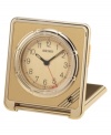 Subtle deco details grace this fine alarm clock from Seiko, perfect for traveling anywhere. Square goldtone and gray mixed metal folding case. Rotating bezel sets alarm. Round goldtone dial with logo, numeral indices, alarm with snooze and luminous hands. Folds into a carrying case. Seven-year battery included. Measures approximately 2-3/4 x 2-5/8 x 1/2. One-year limited warranty.