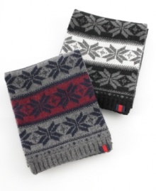 Wrapped in a classic seasonal patterned scarf from Tommy Hilfiger you will be ready to head out in style.