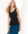 Luxe lace gives INC's sleeveless peplum top nighttime appeal. Try it with jeans or a sleek skirt for a dressier look.